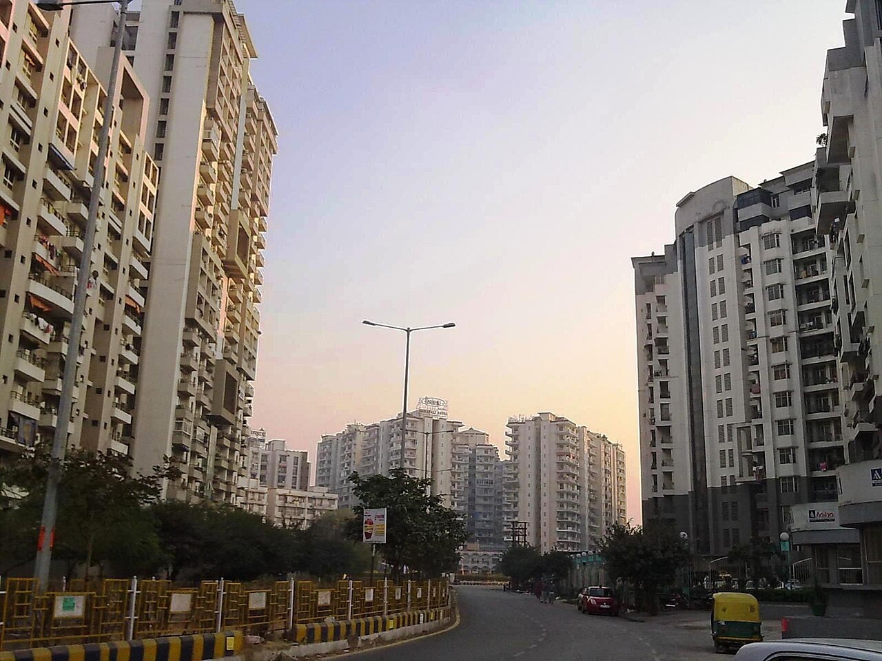 Apartment towers along a street in Ghaziabad